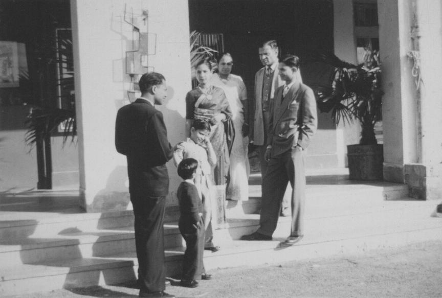 Jain family outside Kumar Gallery in 1962. Standing L-R are Virenda, Sunit, Vinit, Kamal, Prakashwati, Kanshi Ram, and Ravi