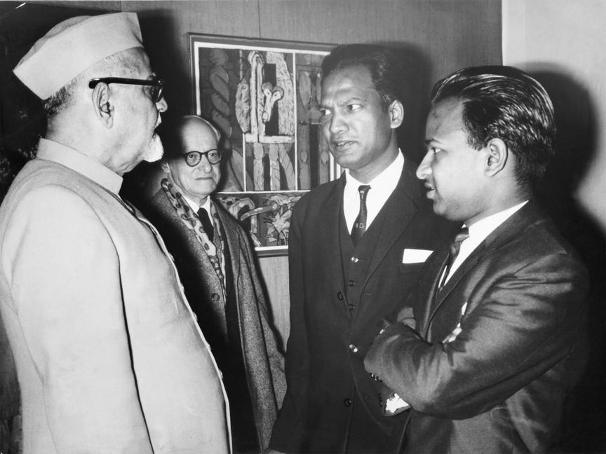 Virendra, 1958, at the Gallery with paintings by Husain, Satish Gujral, Biren De, Kulkarni, Santosh, Almelkar, Laxman Pai, and Krishna Reddy